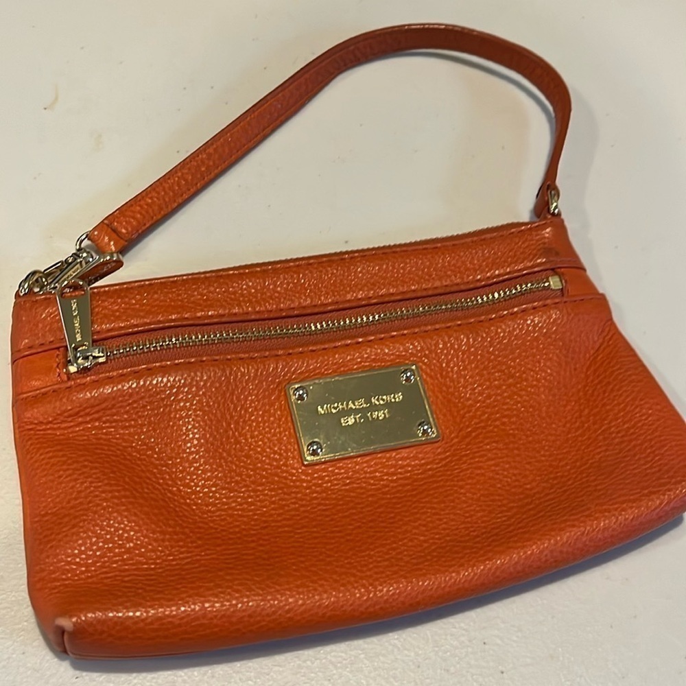 Michael Kors - wristlet.  Clutch. Handbag. Purse. Orange